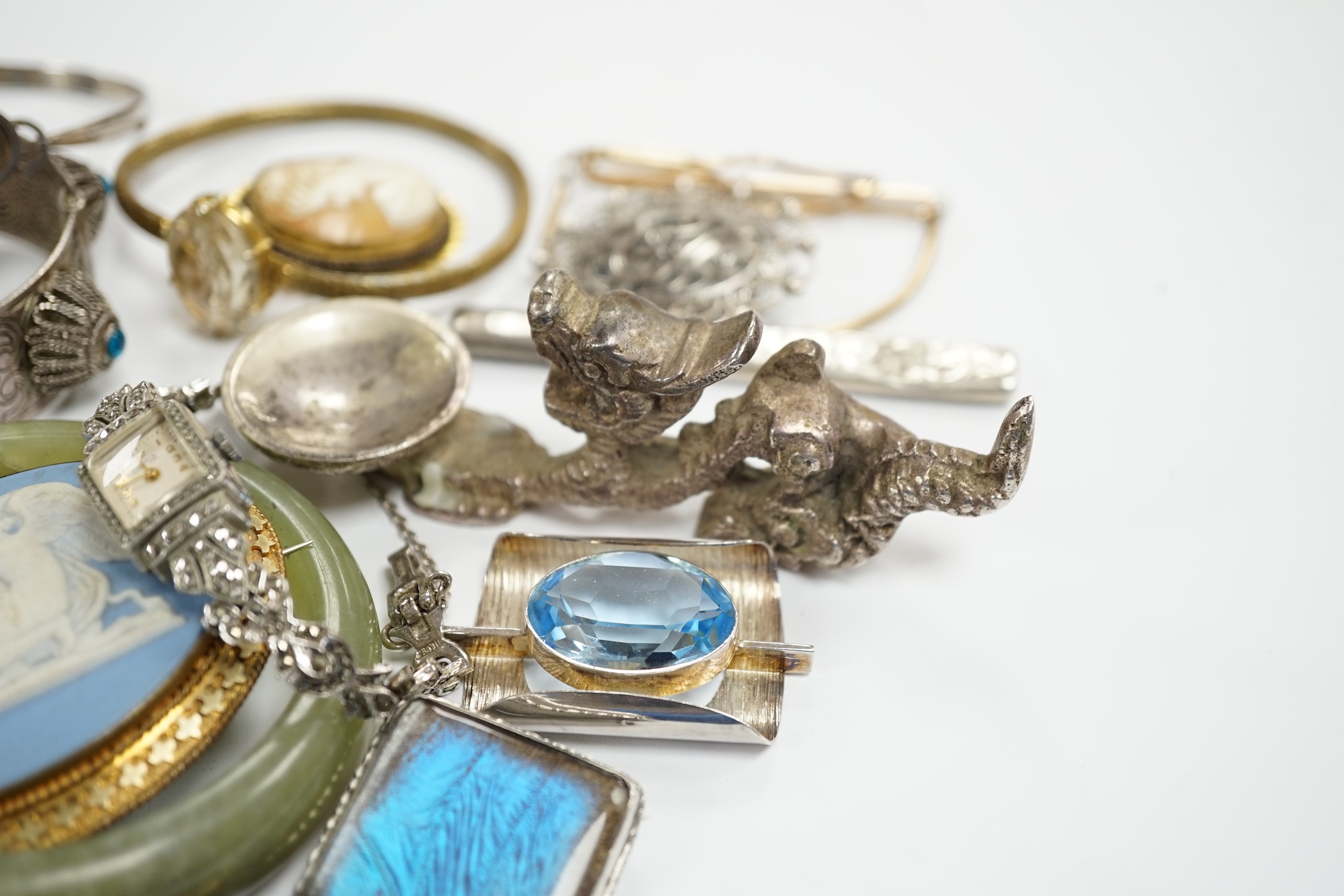 A collection of white metal and mixed costume jewellery, including bracelets, necklaces, bangles etc and a silver cased pair of scissors.